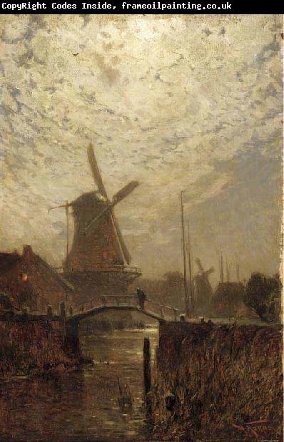 Walter Moras A figure crossing a bridge over a Dutch waterway by moonlight